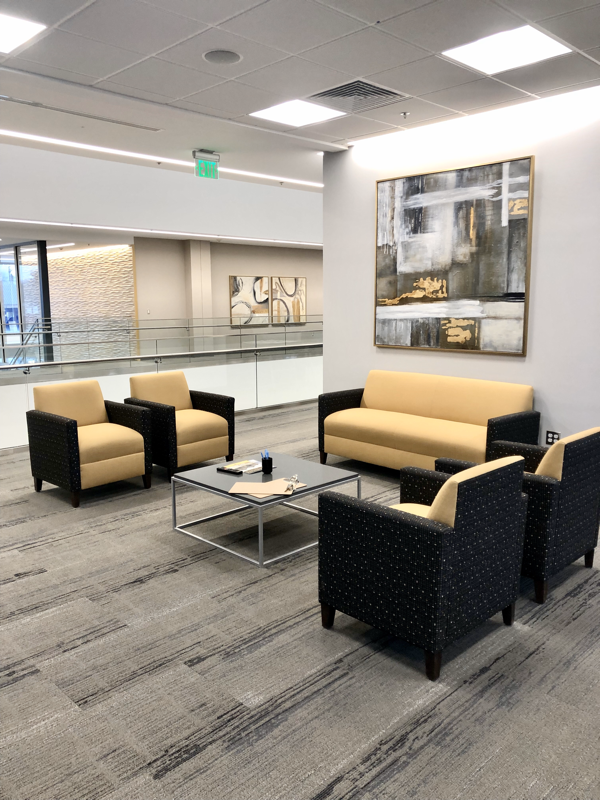 waiting area for a bank commercial interior design artwork and furniture 